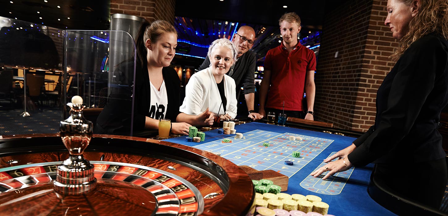 Guests play roulette at Casino Munkebjerg