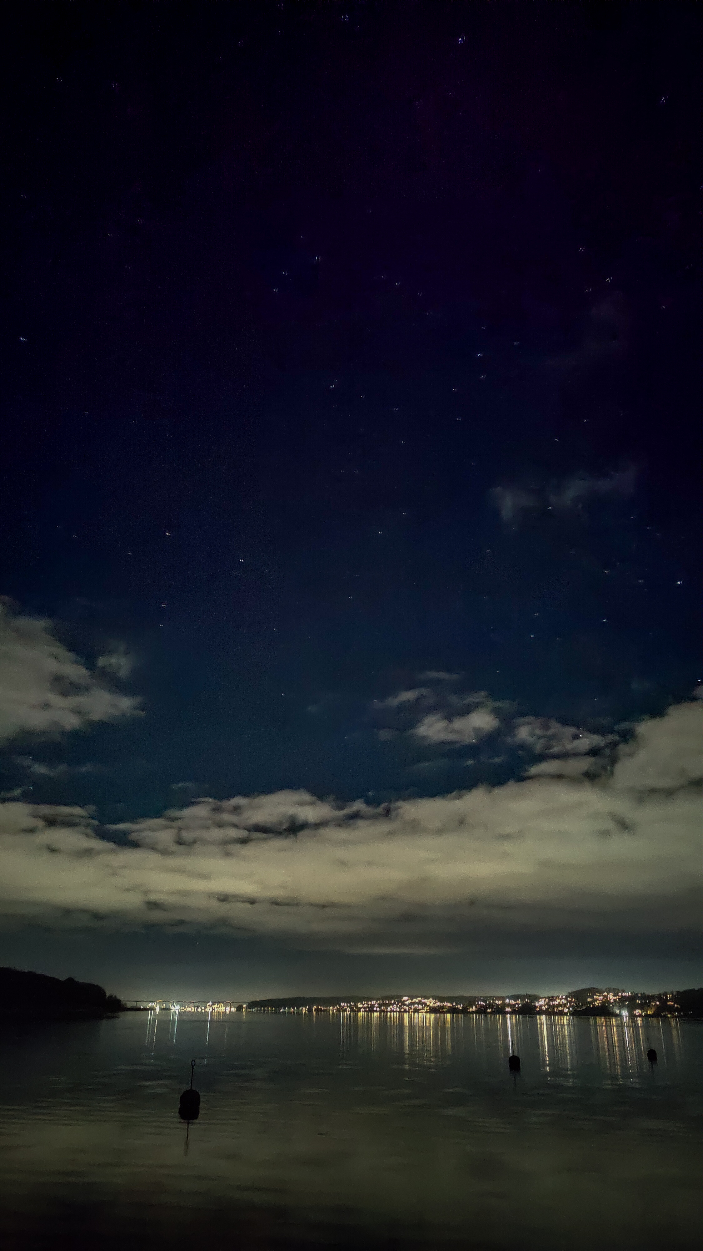 Aftenhimmel med udsigt over Vejle Fjord og lya