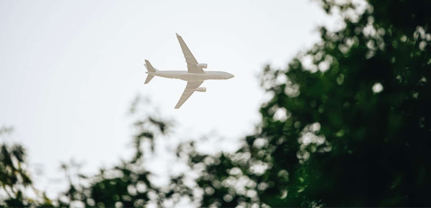 Airplane in the sky on the way to Billund Airport over Vejle