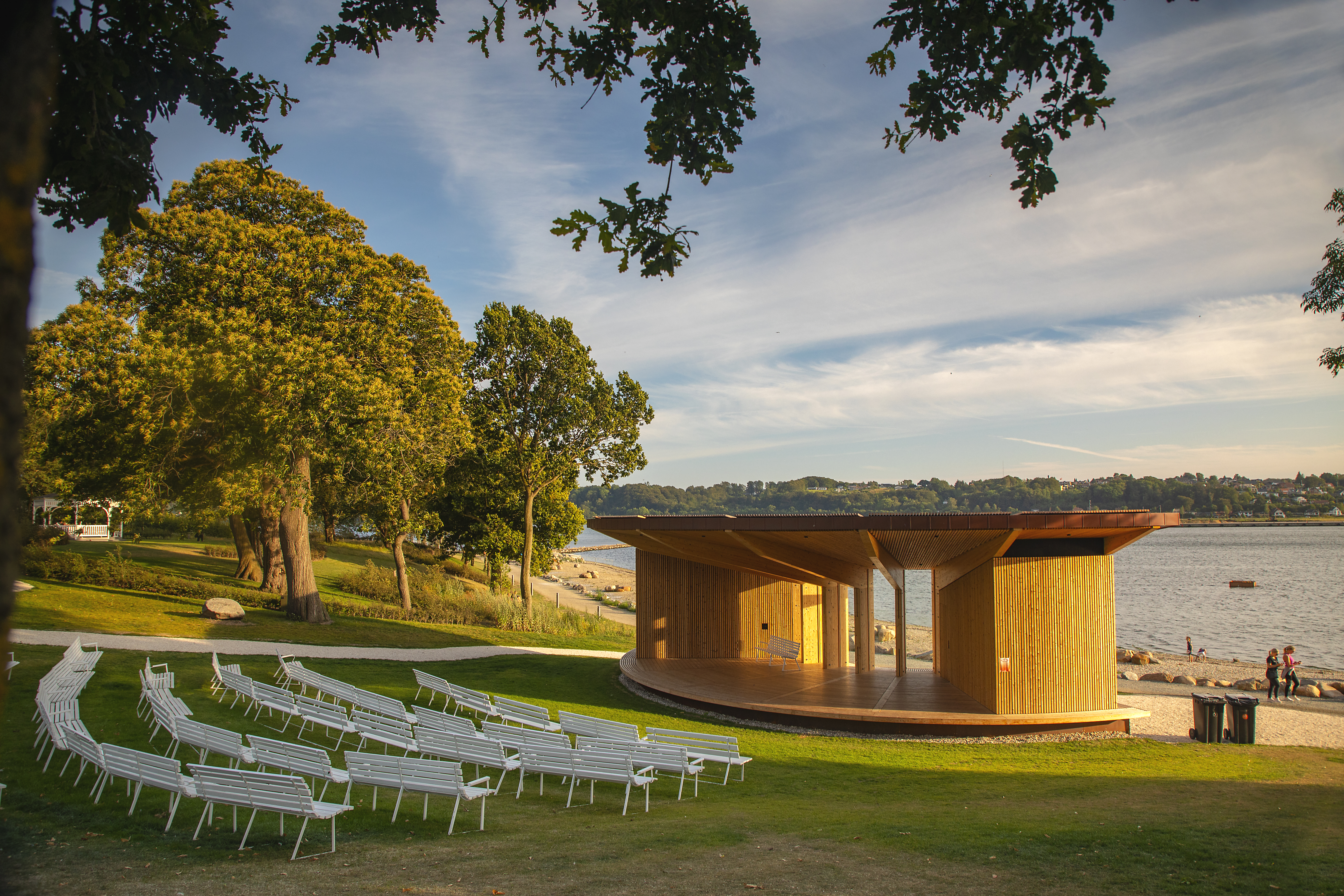 View of the scene in Skyttehushaven and Vejle Fjord at sunset