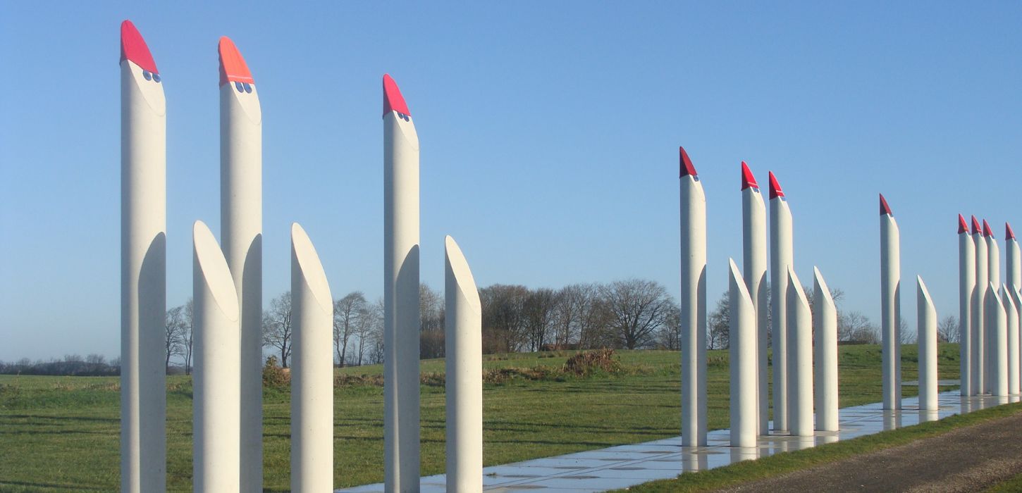 The palisade at Kongernes Jelling with elf hats on