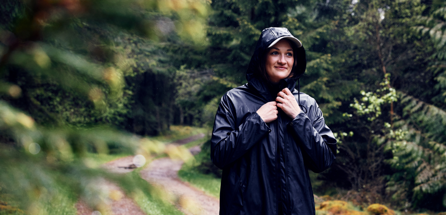 Woman walking on the Hærvejen in the rain