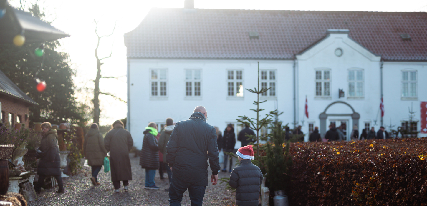 Father and son at the Christmas market at Haughus Manor