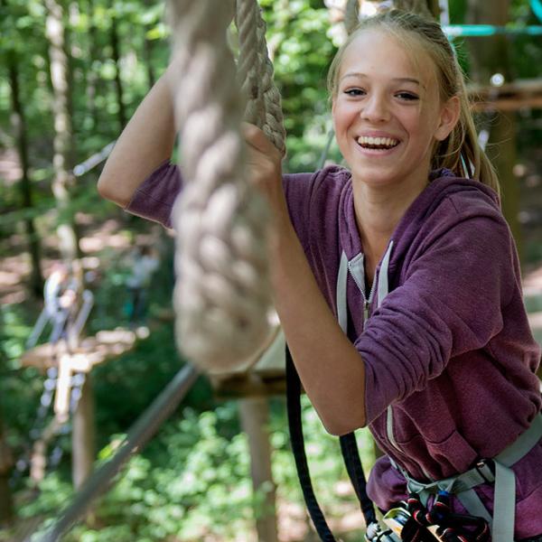 Girl climbs in Gorilla Park in Vejle