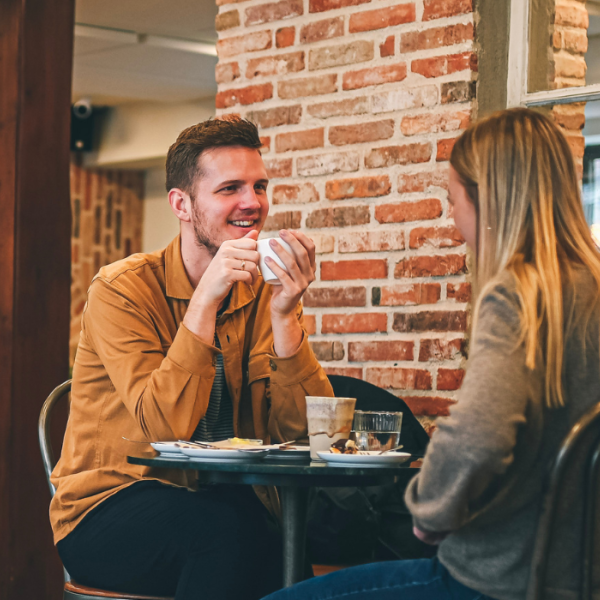 Couple drinking coffee at Konditoriet in Vejle