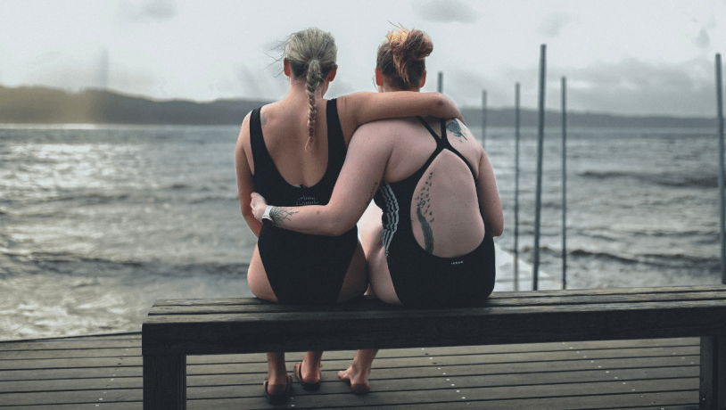Two women on a bench going for a winter swim at Tirsbæk beach