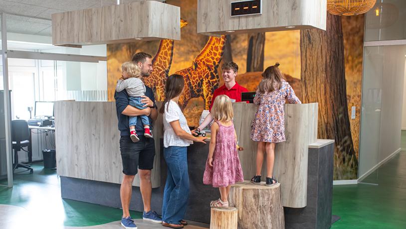 Family is guided by Givskud Zoo Tourist Information