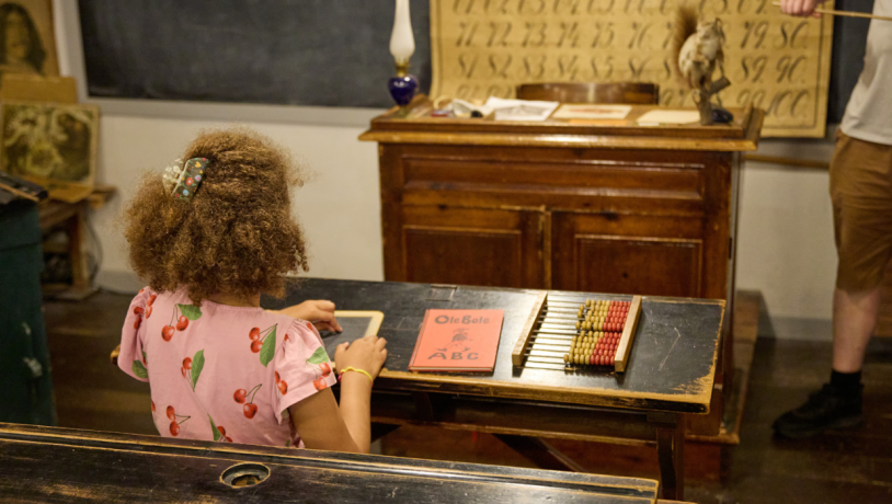 Girl in the classroom at Museum Give