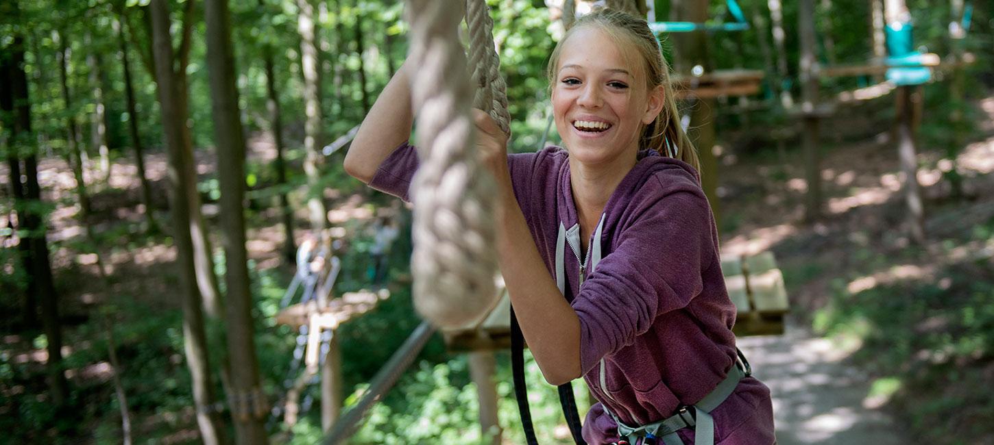 Girl climbs in Gorilla Park in Vejle