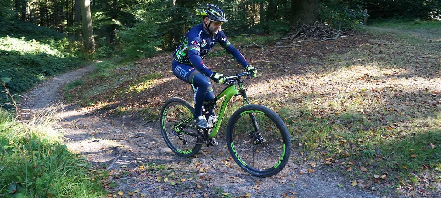A person on a mountain bike in Nørreskoven Forest in Vejle