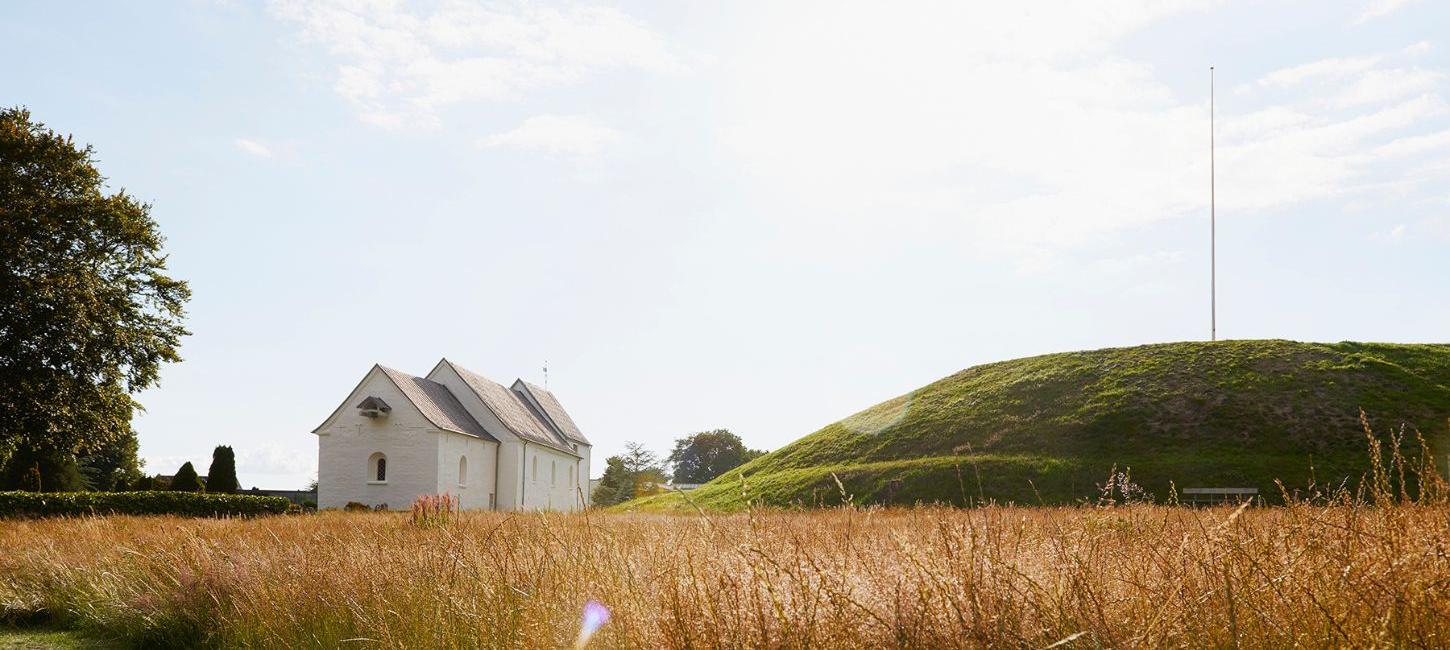 Jelling Church, the one burial mound and the monument area - UNESCO World Heritage