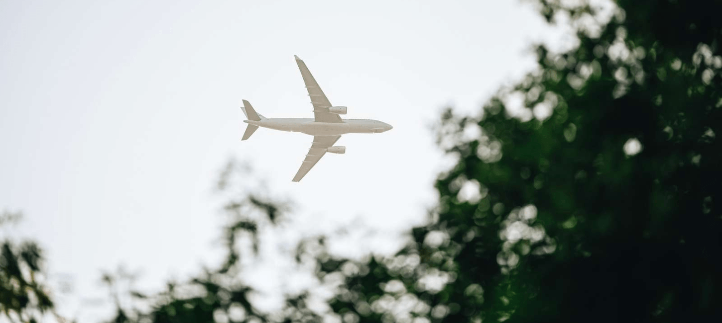 Airplane in the sky on the way to Billund Airport over Vejle