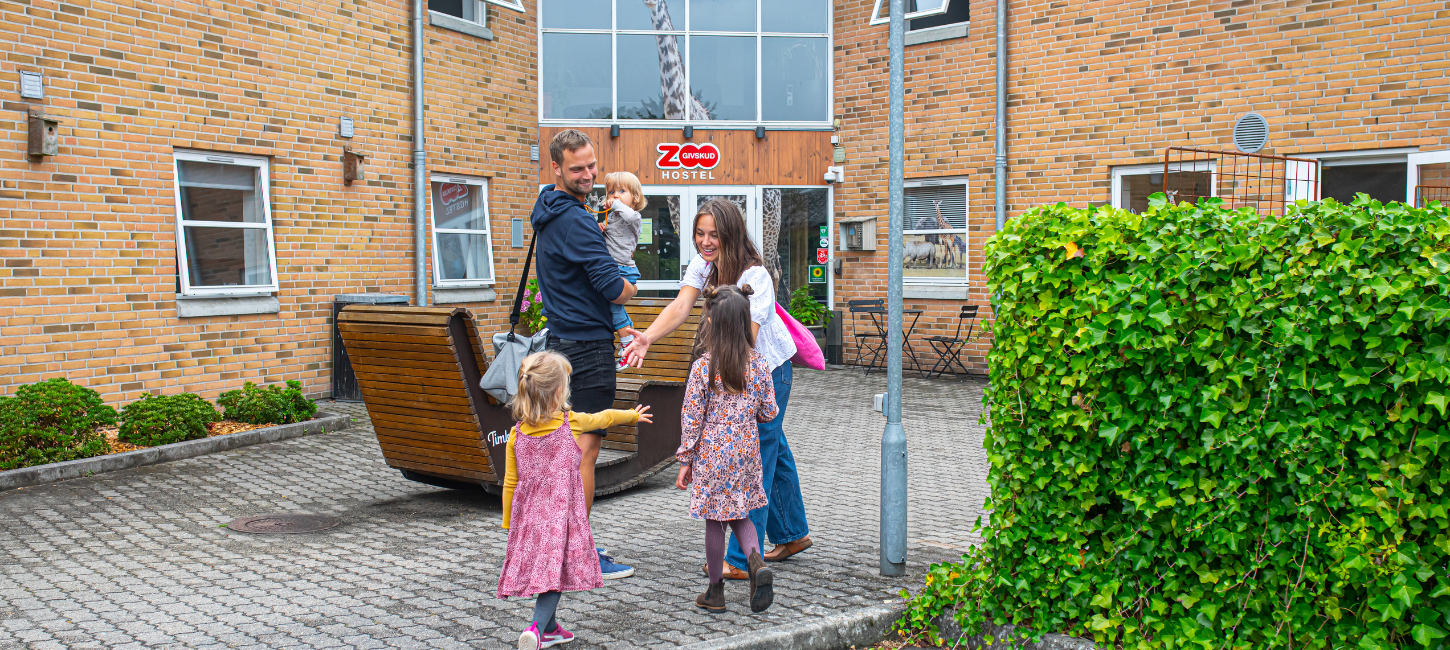Family in front of Givskud Zoo Hostel
