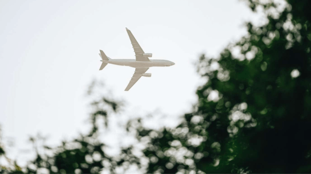 Airplane in the sky on the way to Billund Airport over Vejle