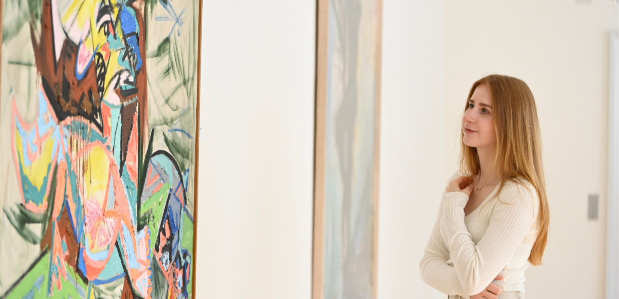 A visitor looks at art at the Vejle Art Museum