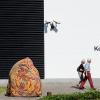 Two people on their way in to see the exhibition in the experience center Kongernes Jelling