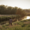 Person who fishes in Vejle Å
