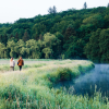 Girls walking in Vejle Ådal by the water