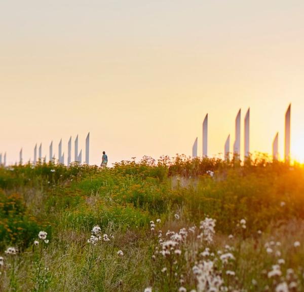 Jelling monument area with the palisades at sunset