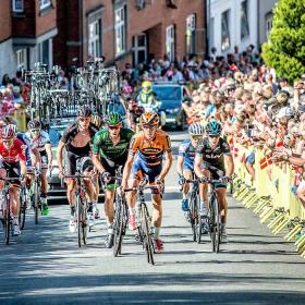 Professional cyclists on their way up Kiddevej on the Queens Stage to PostNord Danmark Rundt