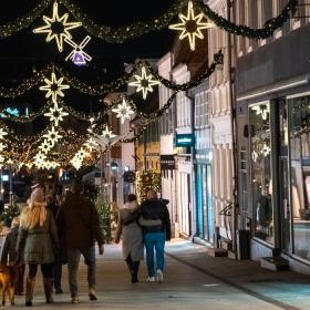 Christmas lights in Vejle pedestrian street with Vejle Windmill in the background
