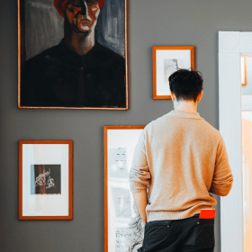 A visitor looks at the art at the Vejle Art Museum