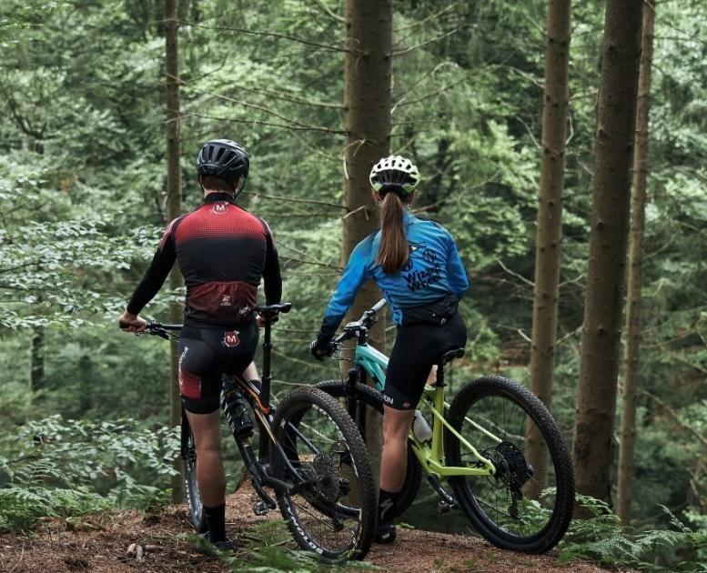  Mountain bikers on a trip in Nørreskoven in Vejle