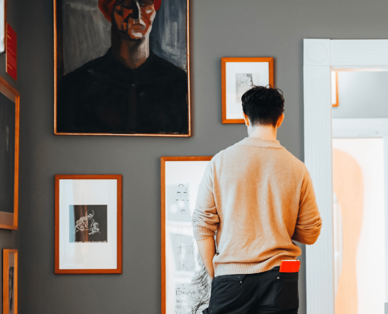 A visitor looks at the art at the Vejle Art Museum